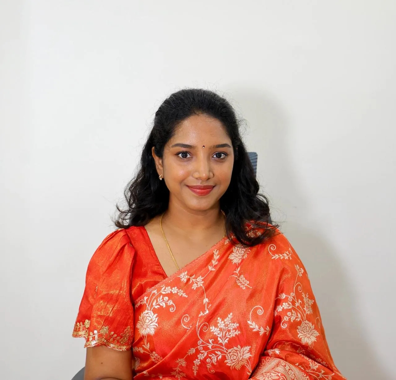 Dr. Thenmozhi